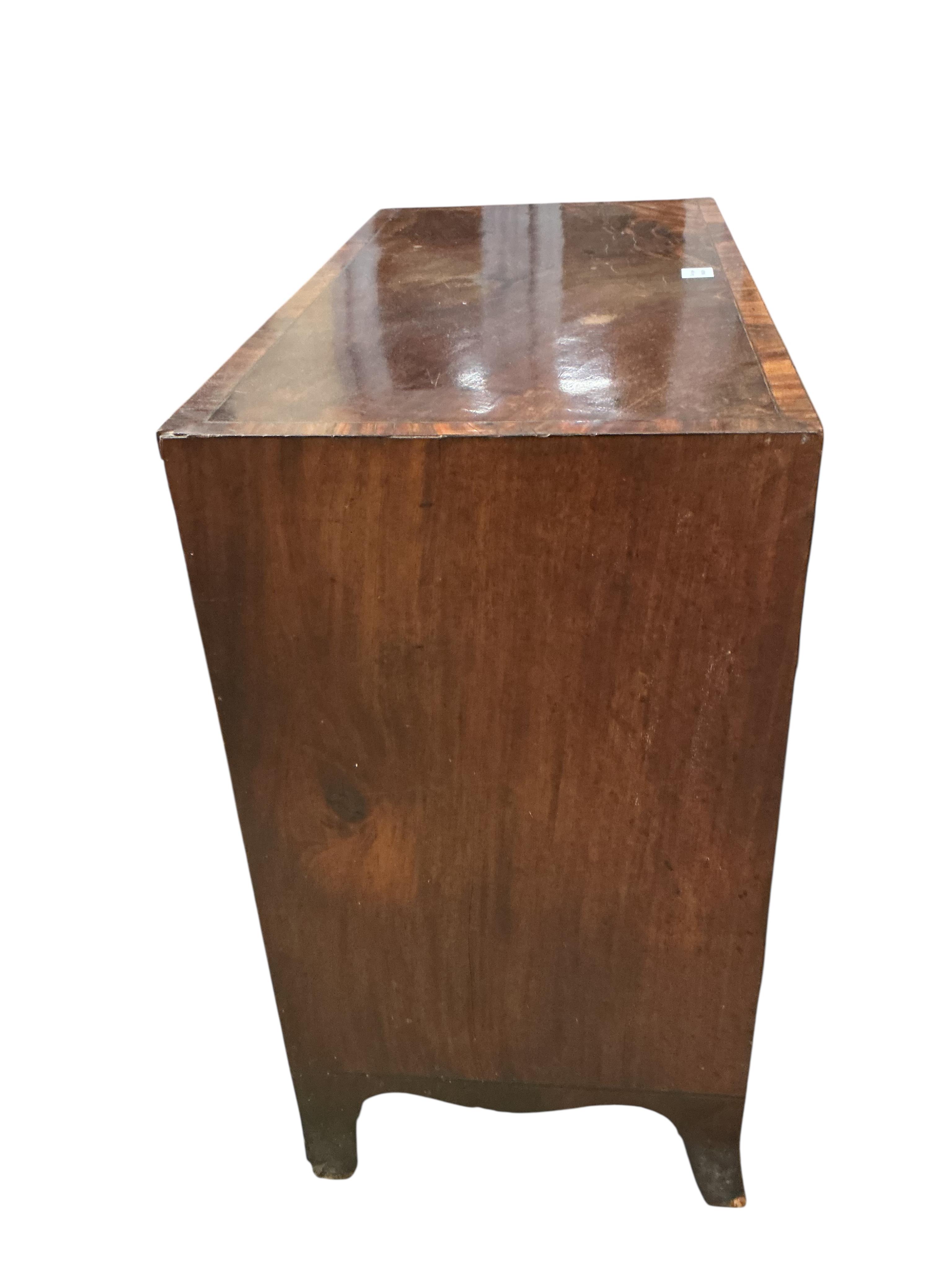 A Regency mahogany straight front chest, fitted four long graduated drawers, under a brushing slide, width 92cm, depth 47cm, height 88cm